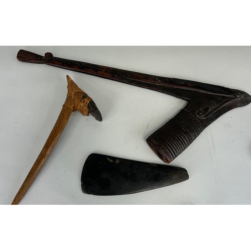 193 - TWO PAPUA NEW GUINEA AXES, 

One from Masim region, the other from highlands. 

Largest 60cm x 48cm