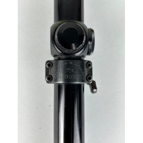 433 - A HOLLAND AND HOLLAND RIFLE SCOPE IN ZEISS BOX, 

No. 35437. 

Redfield Gunsight Co.

25cm L