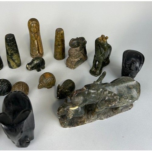 253 - A COLLECTION OF AFRICAN STONE ANIMALS AND FIGURES, 

To include an elephant, hippo, giraffe.