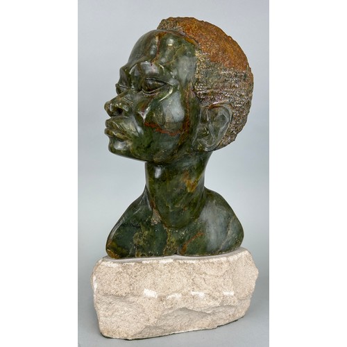 252 - A FINE AFRICAN SOAPSTONE BUST OF A FIGURE MOUNTED ON A STONE STAND,
 
30cm H

On stand 21cm H