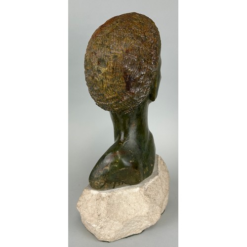 252 - A FINE AFRICAN SOAPSTONE BUST OF A FIGURE MOUNTED ON A STONE STAND,
 
30cm H

On stand 21cm H