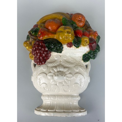 220 - A CERAMIC GLAZED PAINTED MODEL OF AN URN WITH FRUIT, 

45cm x 35cm