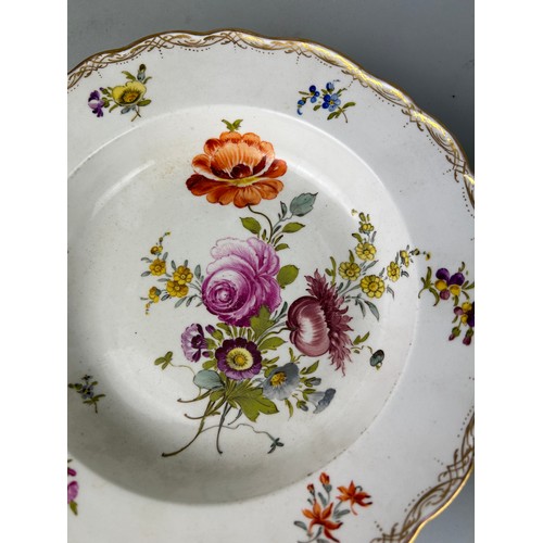 219 - A PAIR OF 19TH CENTURY MEISSEN DISHES PAINTED WITH FLOWERS, 

23cm D