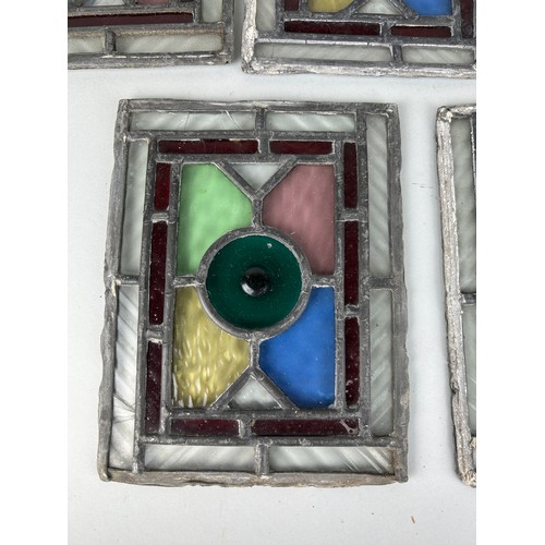 223 - A GROUP OF FIVE STAINED GLASS WINDOW PANES (5), 

22cm x 18cm each.