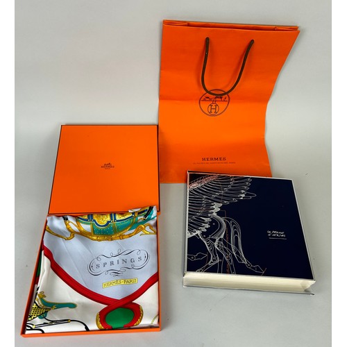 230 - AN HERMES SILK SCARF 'SPRINGS', 

In original box, with Hermes bag. 

88cm D