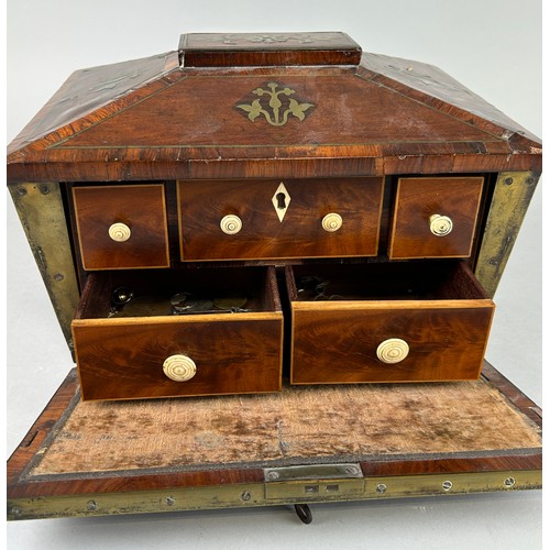 30 - A REGENCY PERIOD BOX WITH BRASS INLAY AND LION HEAD HANDLES, 

The fall front opening to reveal draw... 