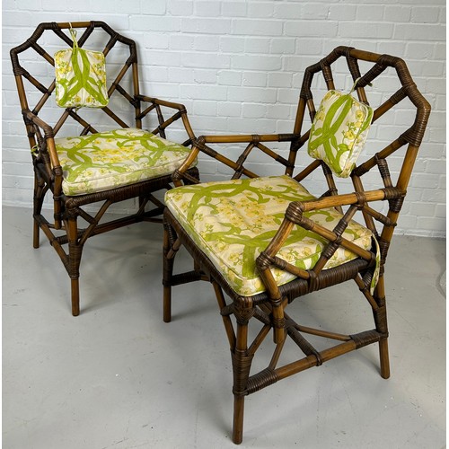 450 - A PAIR OF BRIGHTON PAVILLION STYLE BAMBOO 'COCK-PEN' ARMCHAIRS, 

With cushions. 

97cm x 56cm x 50c... 