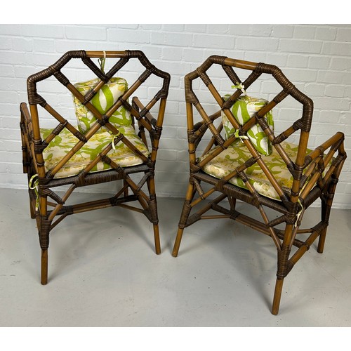 450 - A PAIR OF BRIGHTON PAVILLION STYLE BAMBOO 'COCK-PEN' ARMCHAIRS, 

With cushions. 

97cm x 56cm x 50c... 