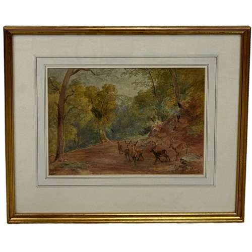 320 - A WATERCOLOUR PAINTING ON PAPER DEPICTING A GROUP OF DEER OR STAGS WALKING IN WOODLANDS, 

Inscribed... 