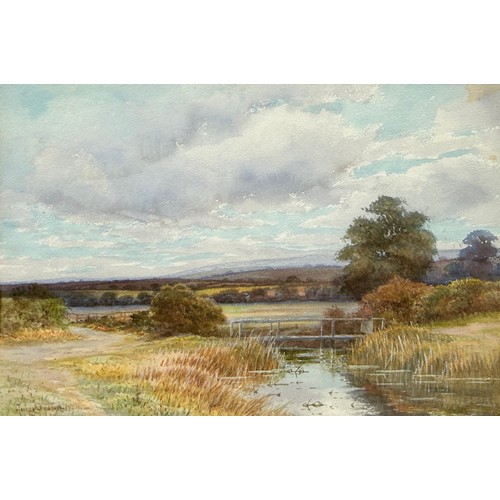 316 - GEORGE OYSTON (BRITISH 1860-1937): A WATERCOLOUR PAINTING ON PAPER DEPICTING A LANDSCAPE SCENE WITH ... 