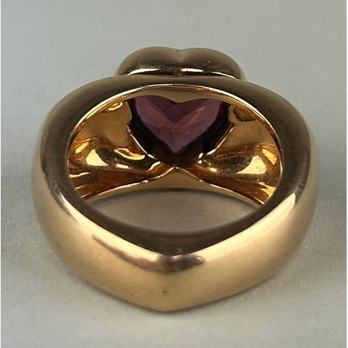 166 - A PIAGET 18CT GOLD RING SET WITH A CENTRAL RED STONE, 

Weight: 19.1gms