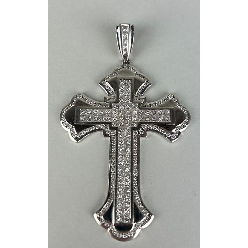 179 - A GENTLEMAN'S PLATINUM CROSS SET WITH DIAMONDS, 

Weight: 42.5gms 

8cm x 5cm