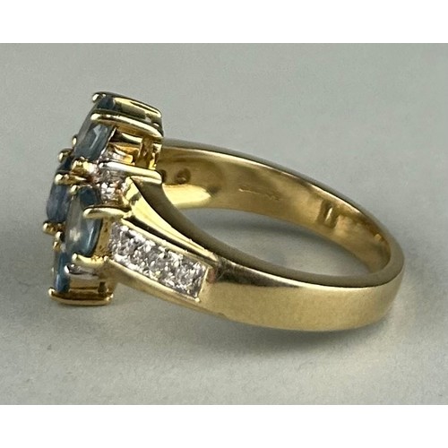 168 - A 9CT GOLD RING SET WITH BLUE STONES, 

Weight: 5.8gms