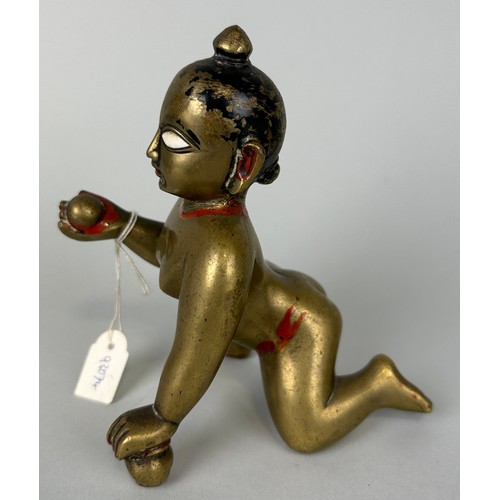 236 - A SOUTH EAST ASIAN BRONZE CROUCHING FIGURE, 

12cm x 11cm