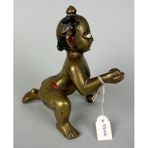 236 - A SOUTH EAST ASIAN BRONZE CROUCHING FIGURE, 

12cm x 11cm