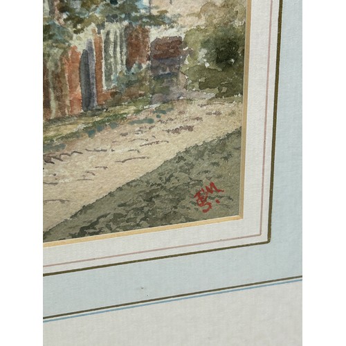 380 - A WATERCOLOUR PAINTING ON PAPER DEPICTING A SCENE OF A COTTAGE WITH A FIGURE,

Initialled EMS

24.5c... 