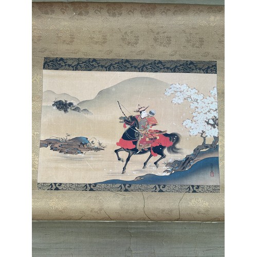 45 - A 19TH CENTURY JAPANESE PAINTING ON SCROLL DEPICTING A HORSE AND RIDER WITH BLOSSOM TREES, 

36cm x ... 