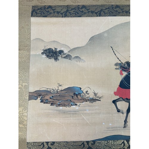 45 - A 19TH CENTURY JAPANESE PAINTING ON SCROLL DEPICTING A HORSE AND RIDER WITH BLOSSOM TREES, 

36cm x ... 