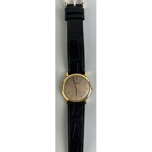 156 - AN 18CT GOLD GENTLEMAN'S PATEK PHILIPPE WRISTWATCH WITH BLACK PATEK STRAP, 

With case. 

Dial 29mm ... 