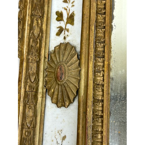 498 - A 19TH CENTURY REGENCY DESIGN WALL MIRROR WITH THREE CANDELABRA,

84cm x 40cm

For restoration.