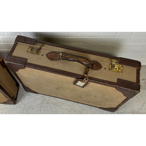 495 - TWO VINTAGE SUITCASES,

Largest 76cm x 51cm x 19cm