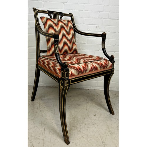 3 - A REGENCY PERIOD EMPIRE ARMCHAIR,

With lyriform splat, gilt top rail, arms and legs, patterned upho... 