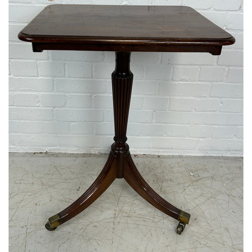 484 - A MAHOGANY PEDESTAL OCCASIONAL TABLE ON CASTORS,

72cm x 50cm x 41cm