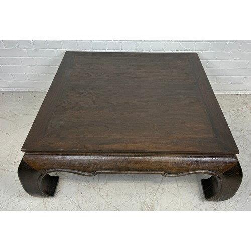 453 - A CHINESE DESIGN OPIUM TABLE ON FOUR SCROLLING LEGS, 

105cm x 105cm x 40cm