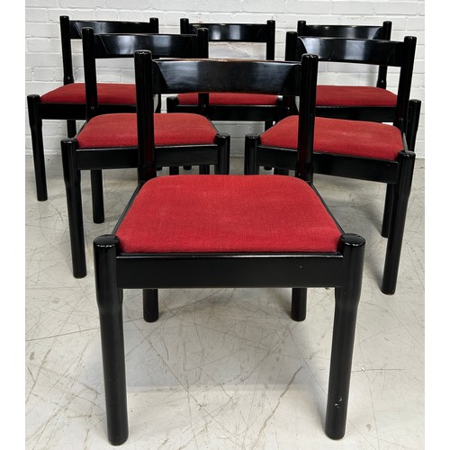 460 - A LARGE DINING TABLE AND SIX CHAIRS BY RYMAN CONRAN, 

The table with ebonised wooden top in two chr... 