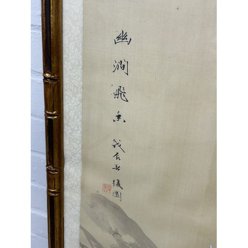 307 - A LARGE CHINESE PAINTING ON SILK DEPICTING BAMBOO SHOOTS, FLOWERS AND BIRDS, 

117cm x 60cm 

Mounte... 