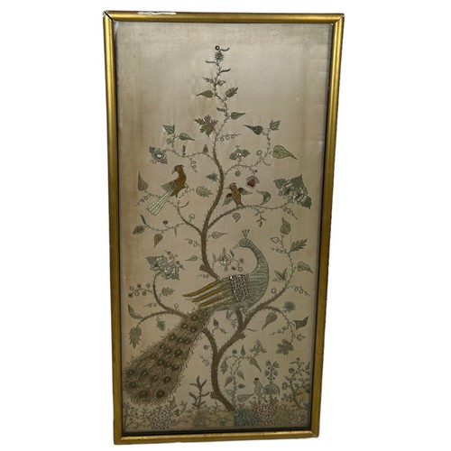 309 - A CHINESE WIRE WORK PICTURE DEPICTING BIRDS AMONGST FOLIAGE, 

112cm x 52cm

Mounted in a frame and ... 