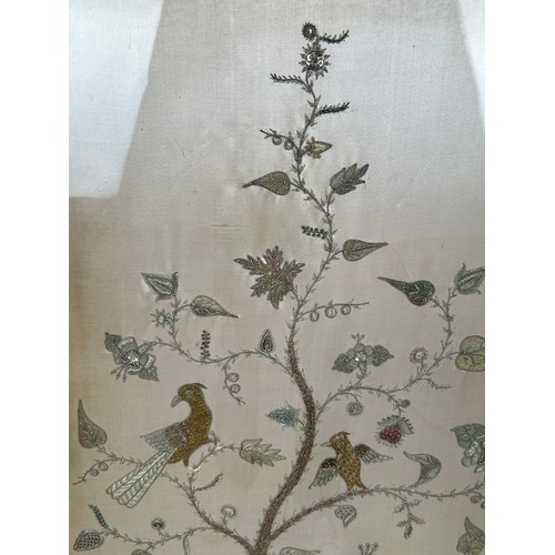 309 - A CHINESE WIRE WORK PICTURE DEPICTING BIRDS AMONGST FOLIAGE, 

112cm x 52cm

Mounted in a frame and ... 