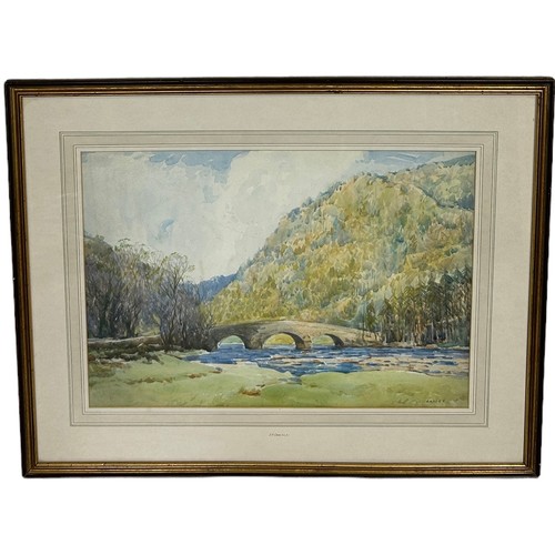 377 - JOHN ARTHUR DEES (1876-1959): A WATERCOLOUR PAINTING ON PAPER DEPICTING A RIVER WITH A BRIDGE, 

54c... 