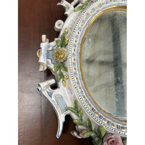 39 - A SMALL DRESDEN PORCELAIN MIRROR AFTER MEISSEN, 

34cm x 27cm