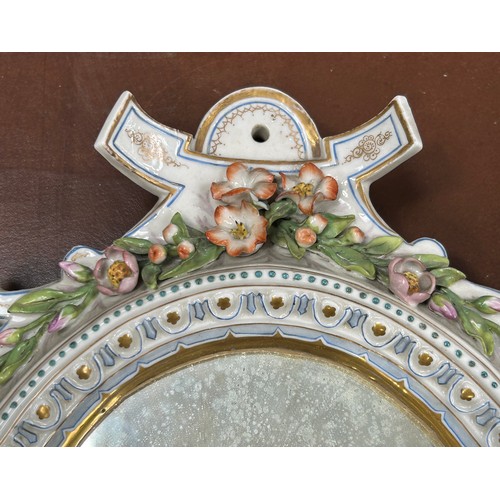 39 - A SMALL DRESDEN PORCELAIN MIRROR AFTER MEISSEN, 

34cm x 27cm