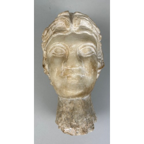 262 - A ROMAN STYLE STONE BUST OF A FIGURE, 

22cm x 12cm