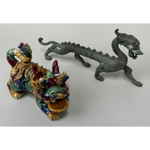 257 - A CHINESE BRONZE DRAGON ALONG WITH A CERAMIC EXAMPLE (2), 

Bronze 32cm L