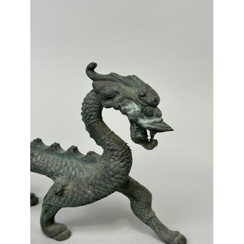 257 - A CHINESE BRONZE DRAGON ALONG WITH A CERAMIC EXAMPLE (2), 

Bronze 32cm L