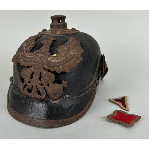 180 - A WORLD WAR I GERMAN LEATHER PICKELHAUBE HELMET, 

Poor conditon, missing spike.