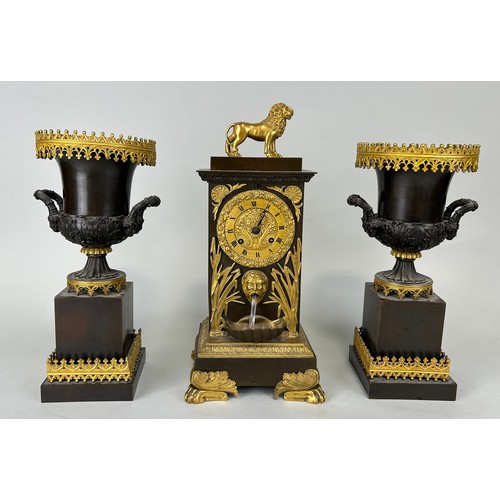 21 - A FRENCH BRONZE CLOCK GARNITURE MARKED FOR DELAUNAY PARIS (3)

Consisting of the clock with gilt met... 