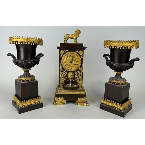 21 - A FRENCH BRONZE CLOCK GARNITURE MARKED FOR DELAUNAY PARIS (3)

Consisting of the clock with gilt met... 