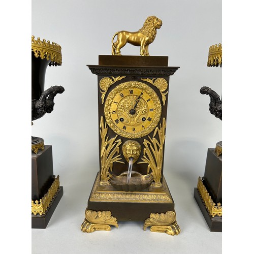 21 - A FRENCH BRONZE CLOCK GARNITURE MARKED FOR DELAUNAY PARIS (3)

Consisting of the clock with gilt met... 