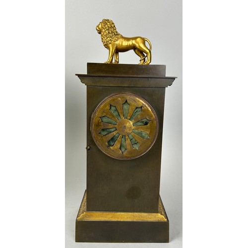 21 - A FRENCH BRONZE CLOCK GARNITURE MARKED FOR DELAUNAY PARIS (3)

Consisting of the clock with gilt met... 