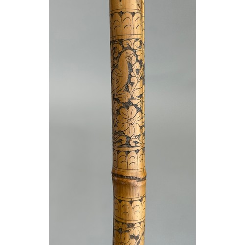 188 - A HIGHLY UNUSUAL CARVED BAMBOO WALKING STICK OR CANE CARVE WITH EXOTIC BIRDS, FIGURES AND FOLIAGE, 
... 