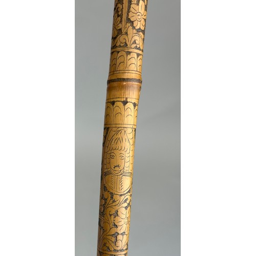 188 - A HIGHLY UNUSUAL CARVED BAMBOO WALKING STICK OR CANE CARVE WITH EXOTIC BIRDS, FIGURES AND FOLIAGE, 
... 