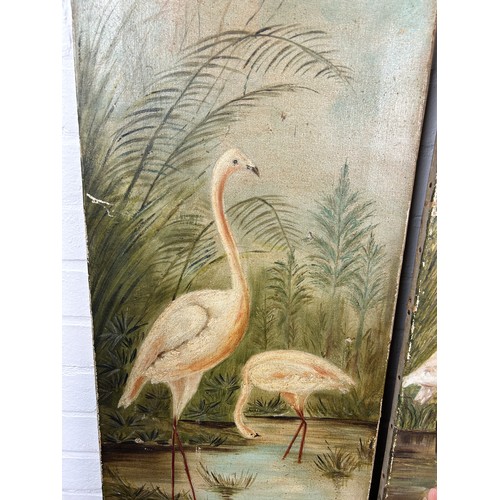 17 - A PAIR OF OIL PAINTINGS ON CANVAS DEPICTING FLAMINGOS IN SHALLOW POOLS OF WATER WITH FLORA AND FAUNA... 