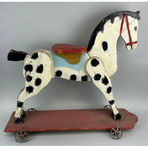 36 - AN ANTIQUE PAINTED WOODEN ROCKING HORSE, 

78cm x 68cm