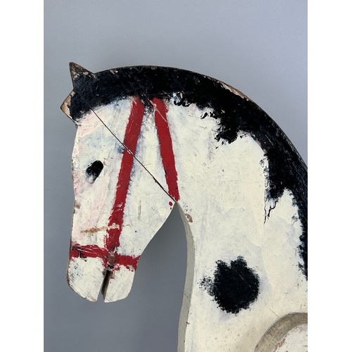 36 - AN ANTIQUE PAINTED WOODEN ROCKING HORSE, 

78cm x 68cm