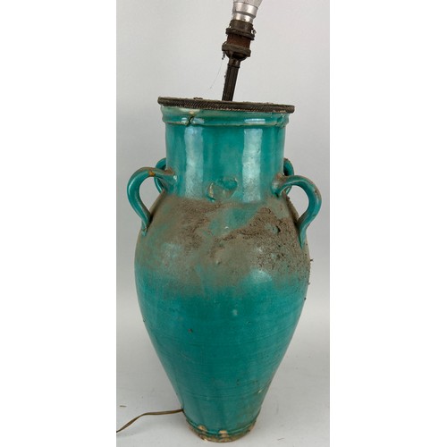 45 - A LARGE BLUE GLAZED CERAMIC JUG WITH FOUR LUG HANDLES, 

Adapted for a lamp. 

51cm x 25cm