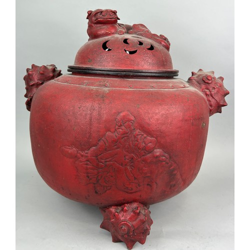 197A - A VERY LARGE CHINESE RED METAL INCENSE BURNER WITH FOO DOG LID, SHELL HANDLES AND FEET, 

Figure of ... 